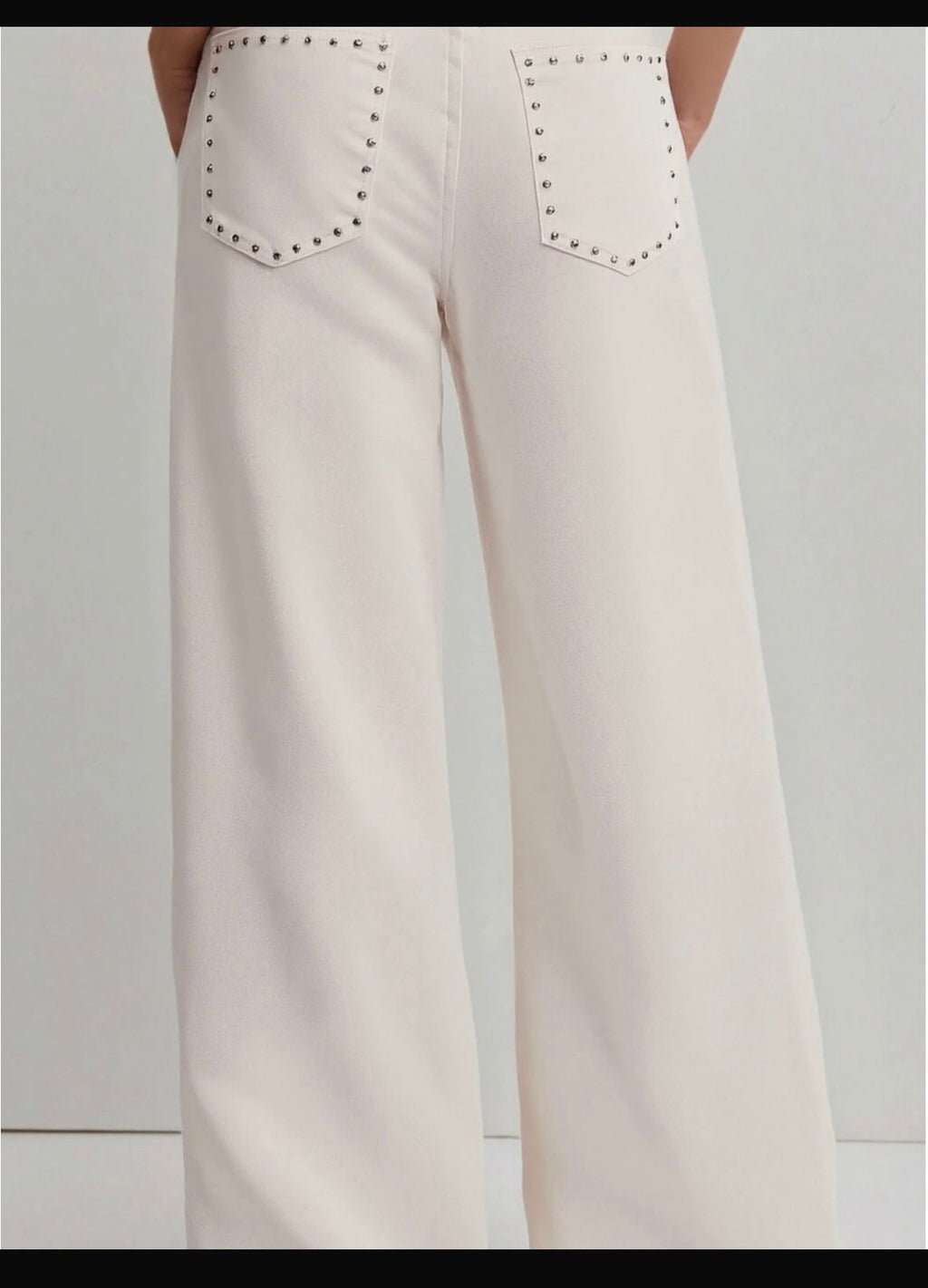 Pantalon tachas
